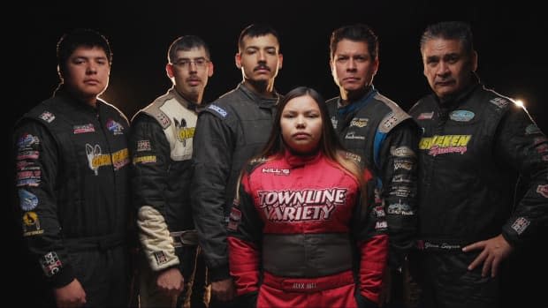 From left, Aaron Turkey, Matthew Hill, Joshua Hill, Derek Miller and Glenn Styres, with Alex Hill, front, are sprint car racers from Six Nations of the Grand River. They're part of a docuseries coming to APTN this spring called Friday Night Thunder that follows Indigenous sprint car drivers and their families at the Ohsweken Speedway.