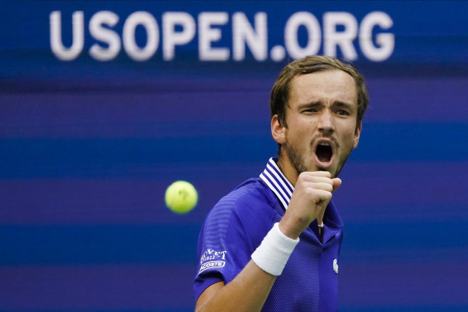 Daniil Medvedev, of Russia, reacts after scoring a point against Felix Auger-Aliassime, of Canada, during the semifinals of the US Open tennis championships, Friday, Sept. 10, 2021, in New York. (AP Photo/Seth Wenig)