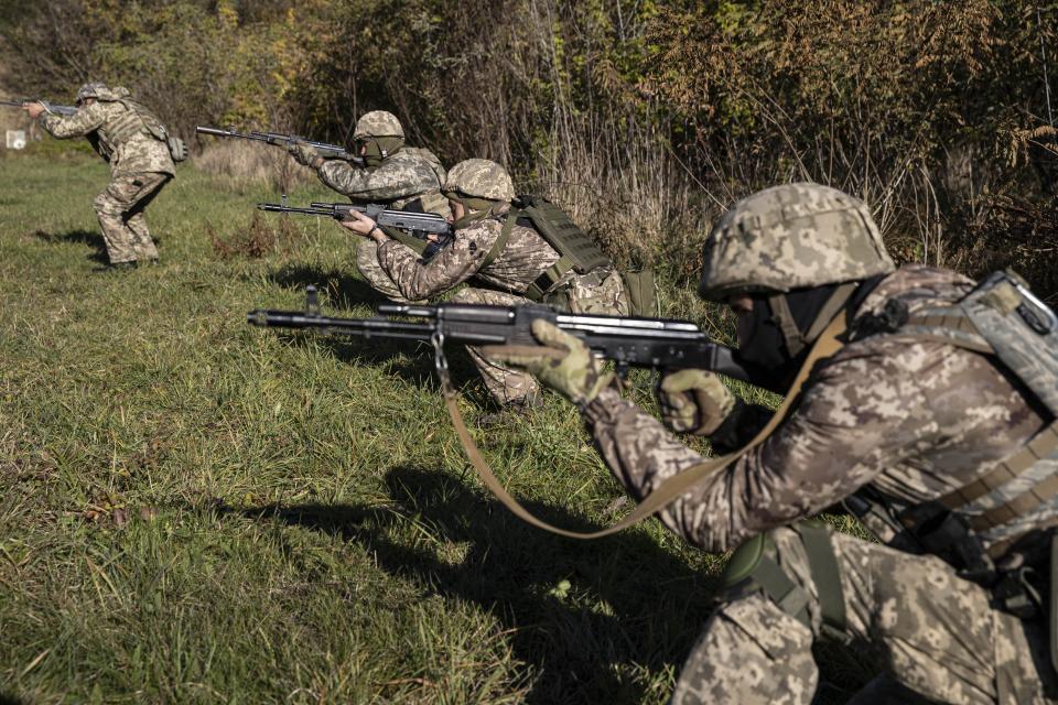 Volunteers of a unit called "Obukhov" take part in weapon training in a district near Kyiv, Ukraine on October 21, 2022.