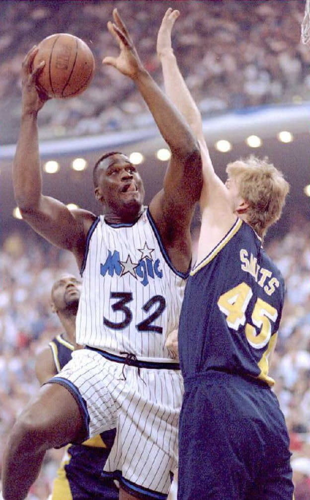 Shaquille O'Neal is guarded by Indiana Pacers Rik Smits during first quarter action during game one of the Eastern Conference Finals at The Arena in Orlando, Florida. O'Neal did not score in the first quarter. (ERNST PETERS/AFP/Getty Images)