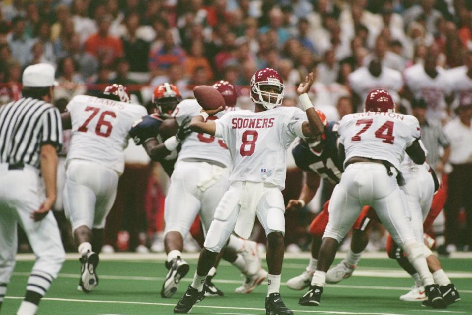 Sept. 3 1994: Quarterback Garrick McGee of the Oklahoma Sooners prepares to pass the ball during a game against the Syracuse Orangemen. Oklahoma won the game 30-29. Rick Stewart /Allsport