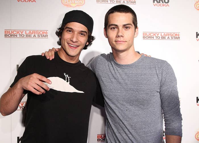 Tyler and Dylan posing on a red carpet together
