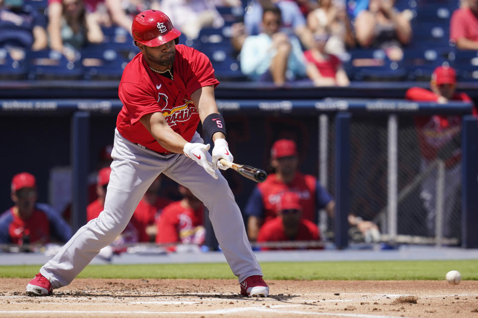 St. Louis Cardinals' Albert Pujols (5) grounds into a double play in the first inning of a spring training baseball game against the Washington Nationals, Wednesday, March 30, 2022, in West Palm Beach, Fla. (AP Photo/Sue Ogrocki)