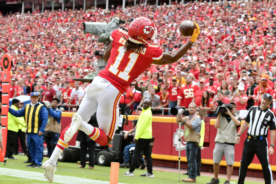 Kansas City Chiefs wide receiver Demarcus Robinson (11) makes a one-handed touchdown catch during the first half of an NFL football game against the Baltimore Ravens in Kansas City, Mo., Sunday, Sept. 22, 2019. (AP Photo/Ed Zurga)