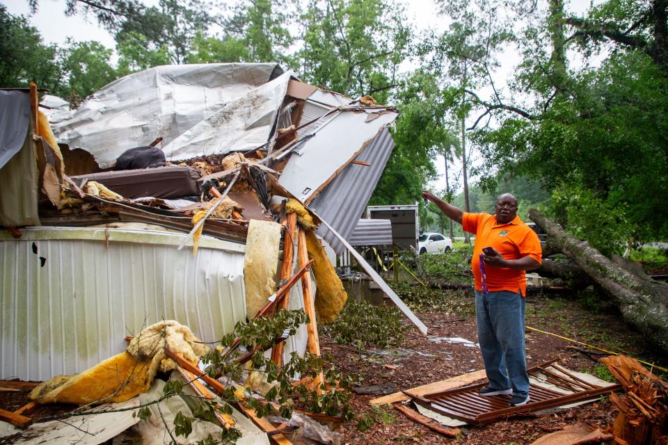 Ed Sutton describes the devastation and heartbreak he experienced as tornadoes tore through Tallahassee on Friday morning. Three days later, Sutton stands on the headboard from the bed where his fiancee, Carolyn Benton was lying when a tree crushed their bedroom, killing Benton.