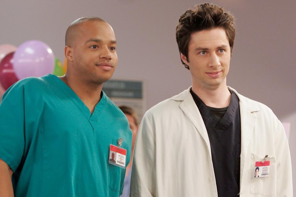 SCRUBS -- "My Life in Four Cameras" Episode 17 -- Aired 2/15/2005 -- Pictured: (l-r) Actor Donald Faison as Dr. Christopher Turk, actor Zach Braff as Dr. John 'J.D.' Dorian