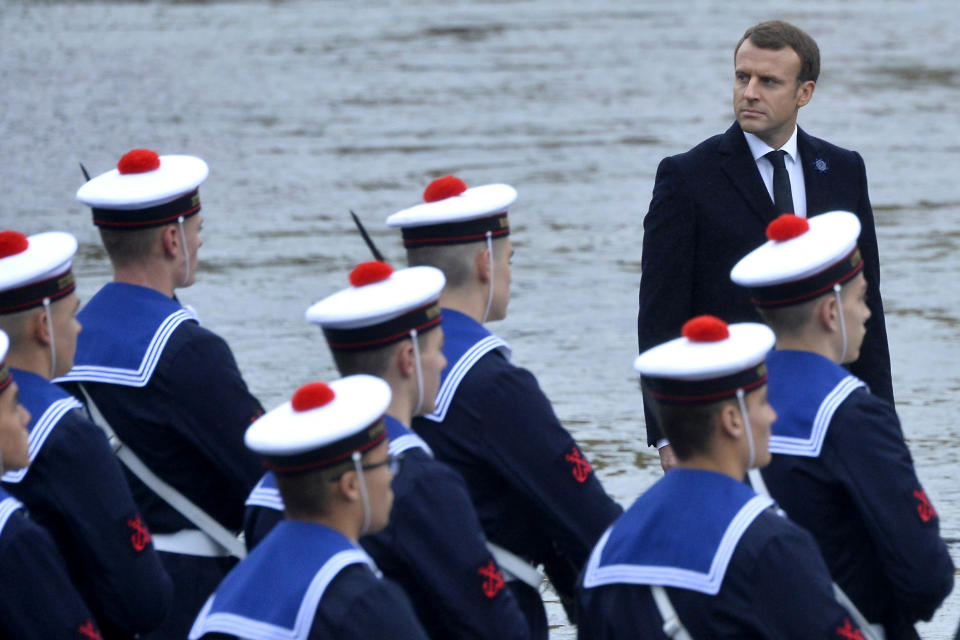 French president Emmanuel Macron reviews the troops during the commemoration of Armistice Day 2017 (Getty)