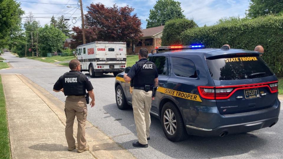 State police are investigating a man who disguised himself in a Garda uniform to carjack and rob an armored truck in Wilmington on June 10, 2022.