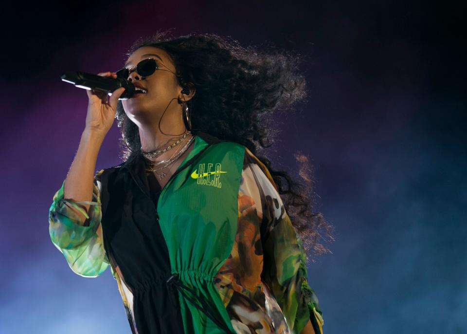 H.E.R performs on the Outdoor stage at the Coachella Valley Music and Arts Festival in Indio, Calif., on Sunday, April 14, 2019.