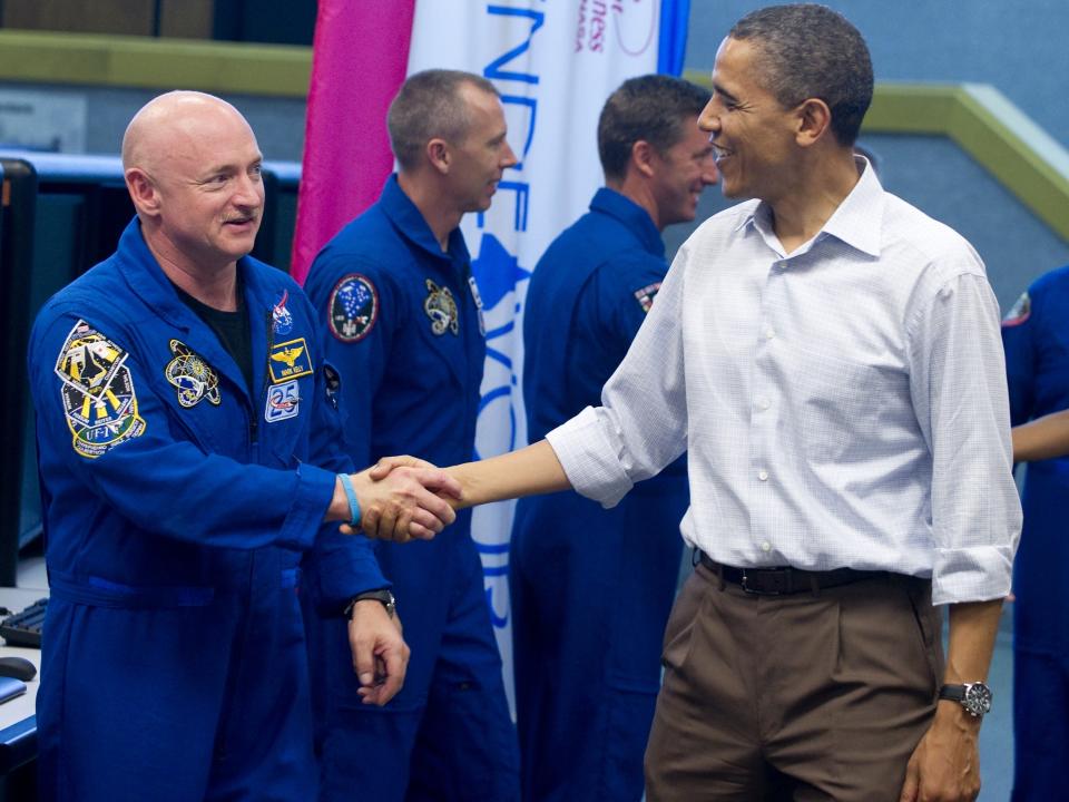 <p>Mark Kelly meets Barack Obama at the Kennedy Space Centre in Florida</p>AFP/Getty