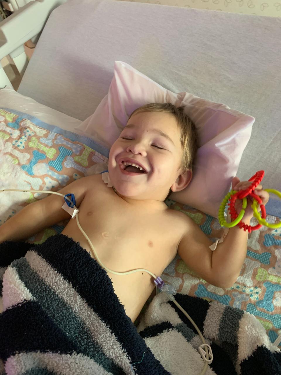 In this photo on Tuesday, less than 24 hours after he received a kidney transplant, David's mom says he's starting to charm the nurses at Cincinnati Children's Hospital.