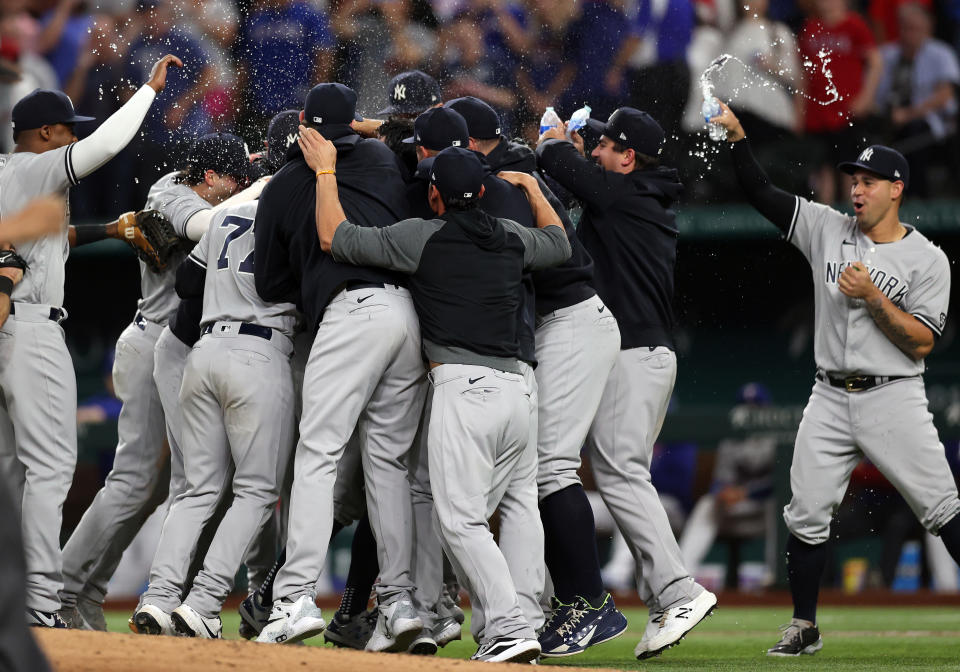 ARLINGTON, TEXAS - MAY 19:  The New York Yankees celebrate a no-hitter by Corey Kluber #28 against the Texas Rangers at Globe Life Field on May 19, 2021 in Arlington, Texas. (Photo by Ronald Martinez/Getty Images)