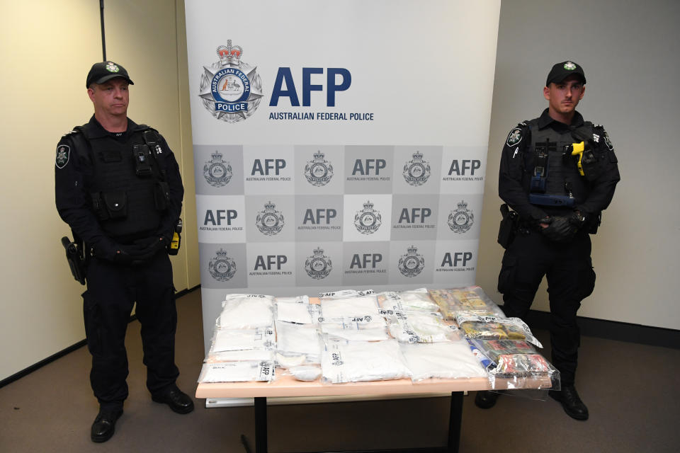 Seized drugs and money are seen at the Australia Federal Police headquarters in Melbourne, January 16, 2019. (AAP Image/James Ross)