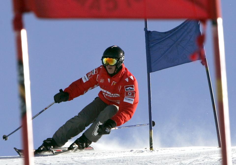 Former Formula One world champion Michael Schumacher skis downhill in the northern Italian resort of Madonna Di Campiglio in this January 14, 2005 file photo. Schumacher suffered a serious head injury while skiing in the French Alps resort of Meribel, French media reported on December 29, 2013. (REUTERS/Alessandro Bianchi)