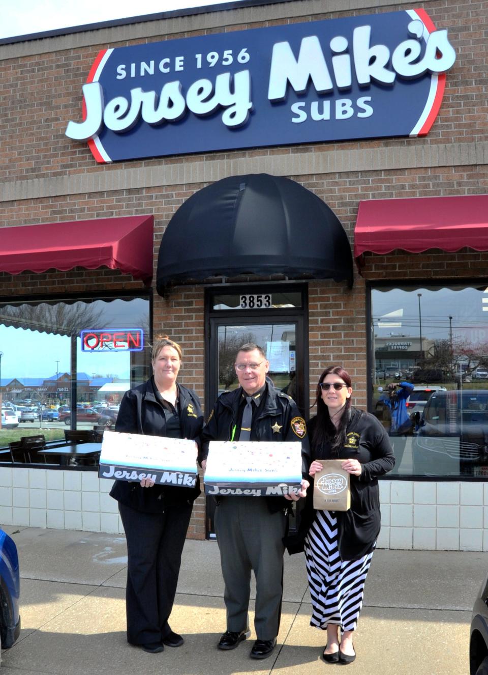 Kristen Slicker, Sheriff Travis Hutchinson, and Crystal Harper made a run to Jersey Mike’s in Wooster on Wednesday, March 30th, to pick up sandwiches for the entire Sheriff’s Office staff.