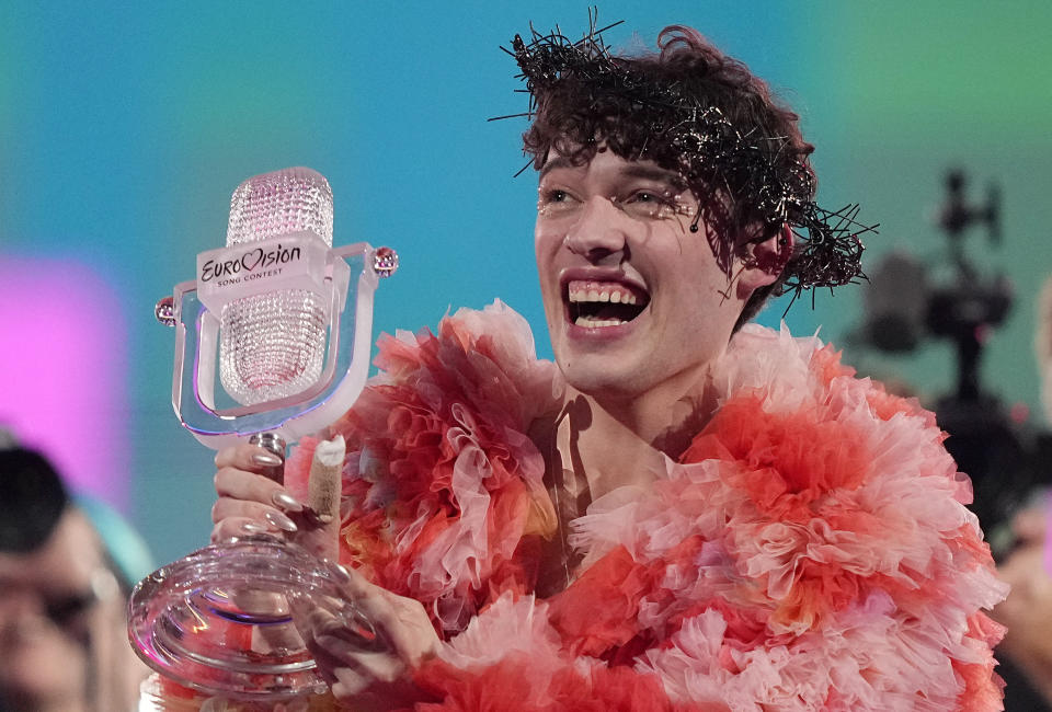 Nemo of Switzerland, who performed the song The Code, celebrates after winning the Grand Final of the Eurovision Song Contest in Malmo, Sweden, Sunday, May 12, 2024. (AP Photo/Martin Meissner)