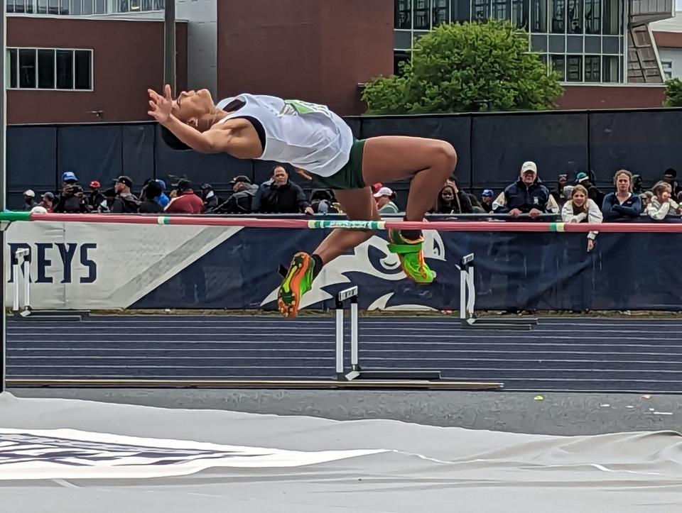 Fleming Island's Gabrielle Flores clears the bar on her way to winning the girls high jump at the Bob Hayes Invitational Track Meet.