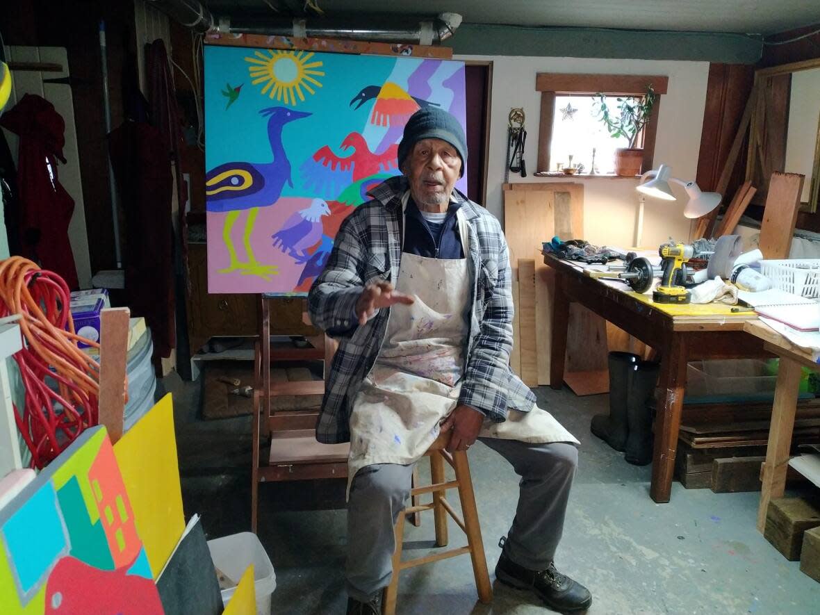 Robert Burke in his painting studio on Vancouver Island. (Submitted by Robert Burke - image credit)