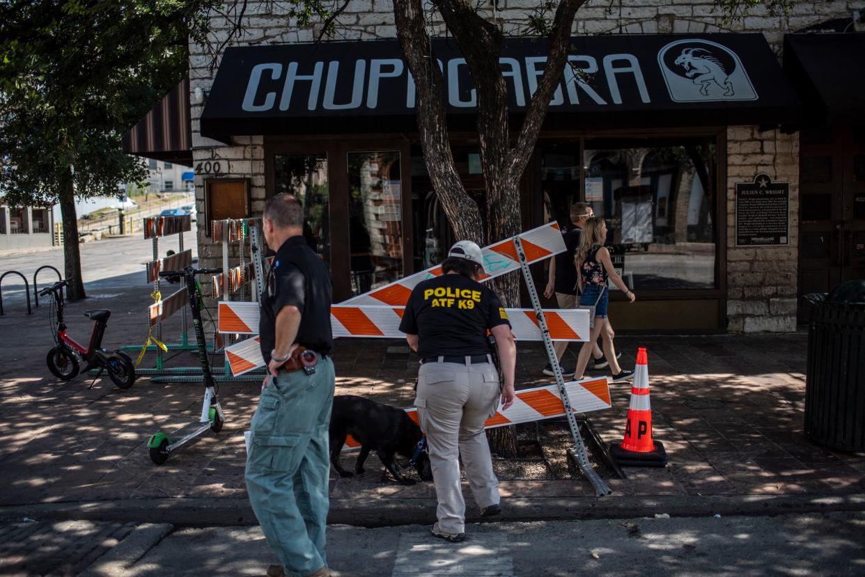 An ATF K9 unit surveys the area near the scene of a shooting on June 12, 2021 in Austin, Texas.