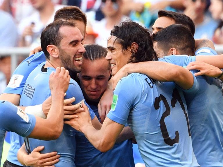 Uruguay vs Russia: Luis Suarez's men outclass 10-man hosts to top Group A and burst Russia's bubble