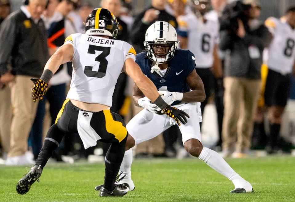 Penn State wide receiver KeAndre Lambert-Smith cuts down the field with the ball around Iowa’s Cooper DeJean during the game on Saturday, Sept. 23, 2023.