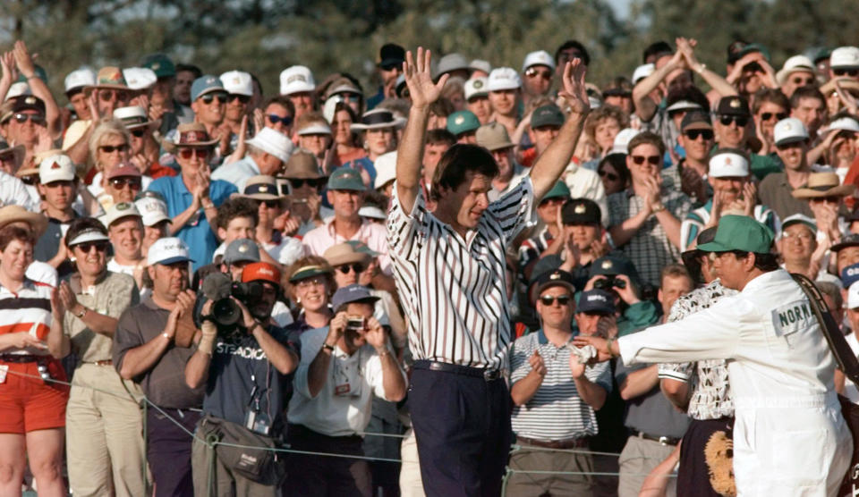 FILE - In this Sunday, April 14, 1996 file photo, Masters champion Nick Faldo acknowledges the gallery at Augusta National Golf Club in Augusta, Ga. Faldo came from behind to beat Greg Norman by five strokes to win his third Masters. It was voted the 5th-best Masters by a panel of writers (AP Photo/David J. Phillip, File)