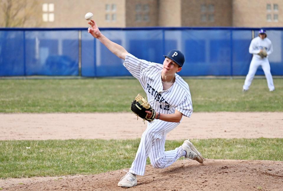 Petoskey's Peyton Harmon delivers a pitch to the plate Tuesday against Traverse City Central in the Big North Conference opener.