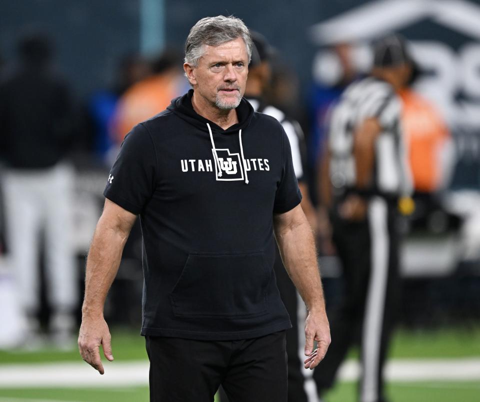 Utah Utes head coach Kyle Whittingham walks the field as Utah and Northwestern prepare to play in the SRS Distribution Las Vegas Bowl on Saturday, Dec. 23, 2023.