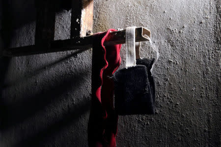 FILE PHOTO: Blindfolds are pictured inside a prison, which according to Syria Democratic Forces (SDF) fighters belonged to Islamic State militants, in Manbij, Aleppo Governorate, Syria, August 17, 2016. REUTERS/Rodi Said/File Photo