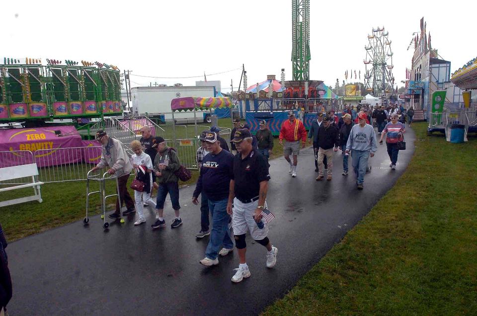 Veterans do the Walk of Honor Monday at the Ashland County Fair, which was Veterans Day.