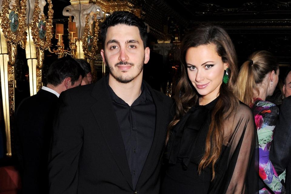 Mohamad Esreb and Camilla Fayed attend a drinks reception celebrating Patrick Cox's 50th Birthday party at Cafe Royal in 2013 (Getty Images)