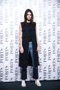 <p>Making a pitstop in China for Shanghai Fashion Week, Jenner looked cool and casual in a long navy vest with pompom details and patchwork high-water jeans <a href="http://www.vogue.com/fashion-shows/fall-2015-ready-to-wear/ports-1961/slideshow/collection#18" rel="nofollow noopener" target="_blank" data-ylk="slk:by Ports 1961;elm:context_link;itc:0;sec:content-canvas" class="link ">by Ports 1961</a>, along with white sneakers. This was one of two outfits she wore to attend the label’s presentation Tuesday—and it’s certainly a chic new take on streetwear for the model.</p>