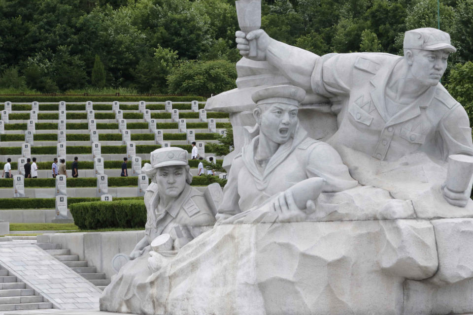 North Koreans visit the Fatherland Liberation War Martyrs Cemetery to pay respects to the monument to the fallen soldiers of the Korean People's Army in Pyongyang, North Korea, Thursday, June 25, 2020. North and South Korea on Thursday marked the 70th anniversary of the start of the Korean War with largely subdued commemorations amid the coronavirus pandemic, a day after the North abruptly halted a pressure campaign against the South. (AP Photo/Jon Chol Jin)