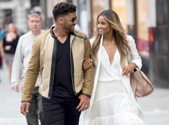 Russell Wilson and Ciara during a women's singles match at the