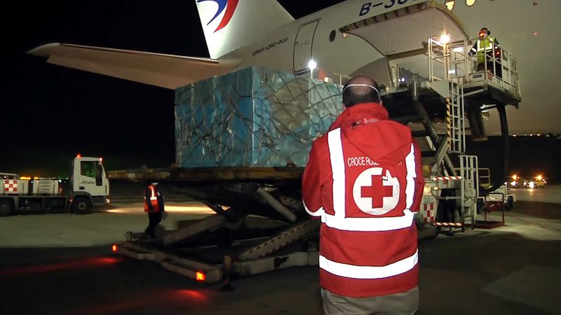 Chinese medical team arrive in Italy with crucial supply of respirators, masks