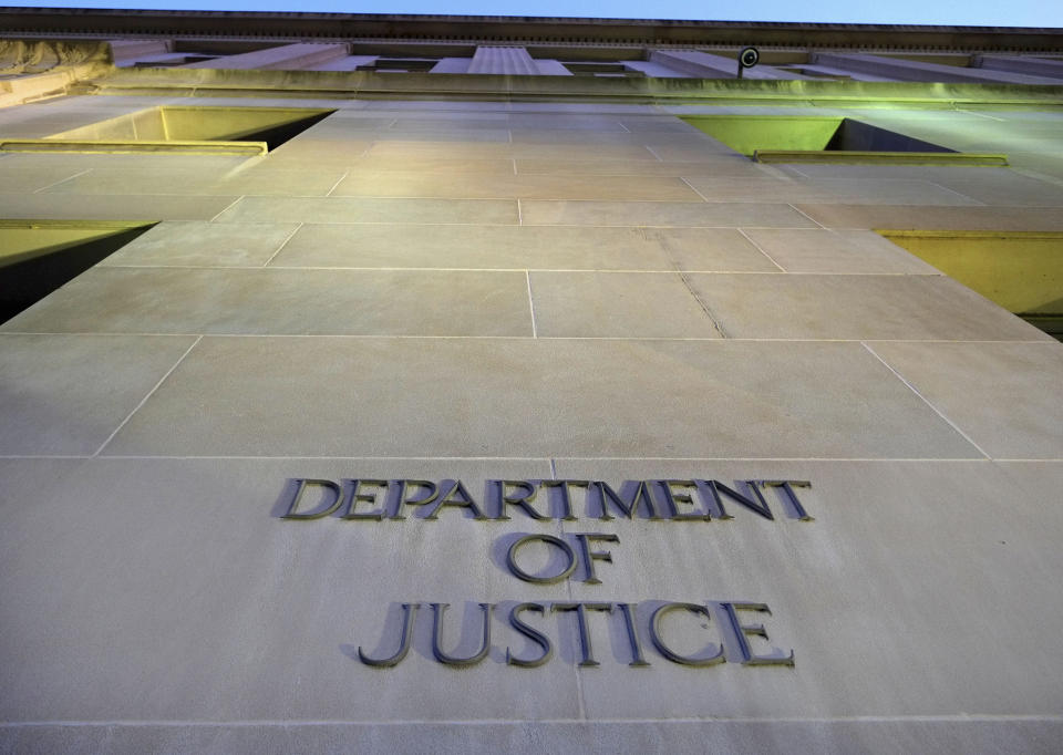 FILE - This May 14, 2013, file photo shows the Department of Justice headquarters building in Washington early in the morning. The Justice Department is shaking up the legal team fighting for the inclusion of a citizenship question on the 2020 census but offered no specifics on why the change was being made. The change announced Sunday, July 7, 2019, comes days after the department vowed to continue to try to find a legal path forward to include the question on the census. (AP Photo/J. David Ake, File)