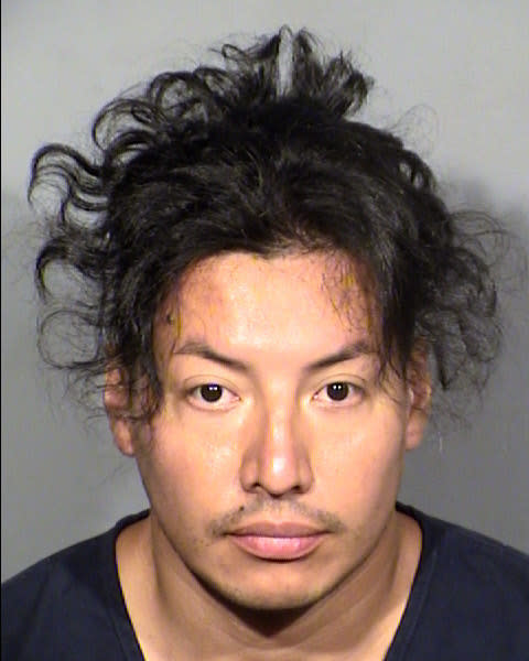 This photo provided by the Las Vegas Police Dept. shows Yoni Barrios. Police say Barrios killed two people and wounded six others in stabbings along the Las Vegas Strip. He was booked on two counts of murder and six counts of attempted murder late Thursday, Oct. 6, 2022. ( Las Vegas Police Dept. via AP)