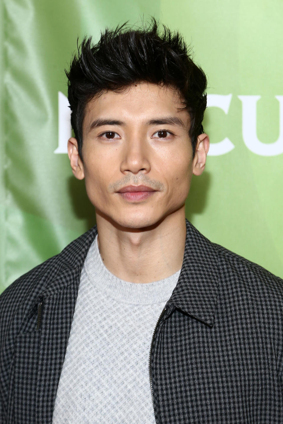 Manny Jacinto on the red carpet