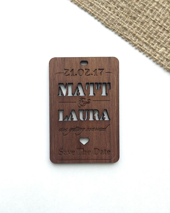Personalised wooden save the date trinket.