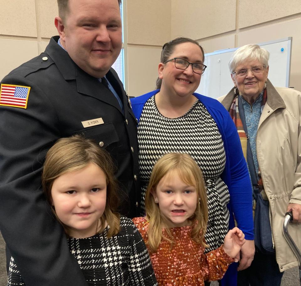 Jerry Hickin is one of Millcreek's first professional firefighters. He is shown with his wife, Heidi, daughters Amelia, 7, at left, and Penelope, 6, and grandmother Sue Hickin. Jerry Hickin also is a third generation West Ridge Fire Department volunteer.