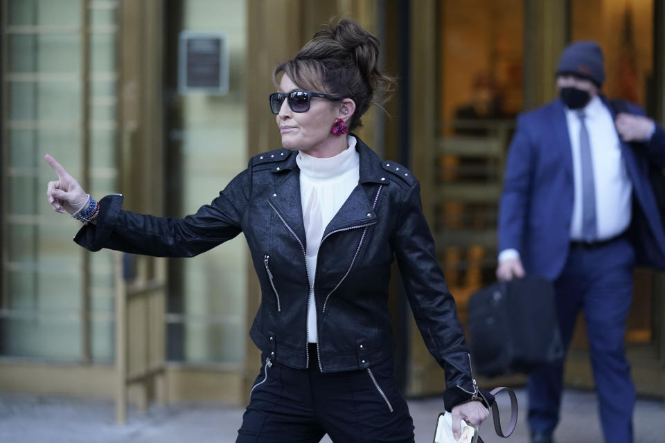 Former Alaska Gov. Sarah Palin leaves a courthouse in New York, Monday, Feb. 14, 2022. A judge said Monday he’ll dismiss a libel lawsuit that Palin filed against The New York Times, claiming the newspaper damaged her reputation with an editorial falsely linking her campaign rhetoric to a mass shooting. U.S. District Judge Jed Rakoff made the ruling with a jury still deliberating at the trial where the former Alaska governor and vice-presidential candidate testified last week. (AP Photo/Seth Wenig)