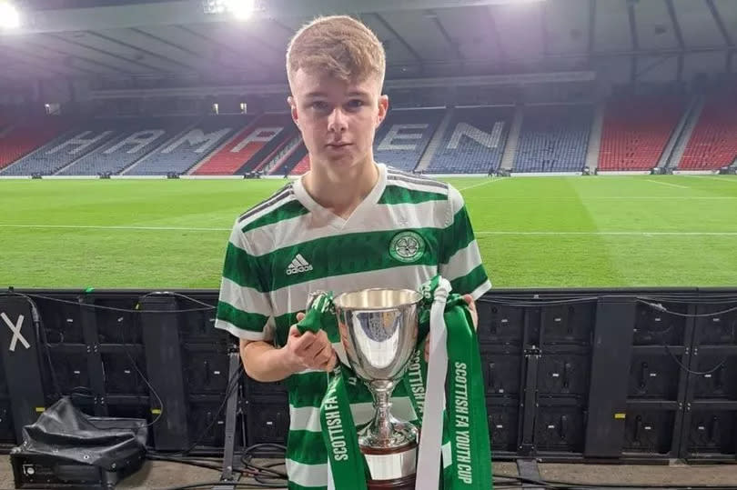 Photo of Francis Turley with the trophy