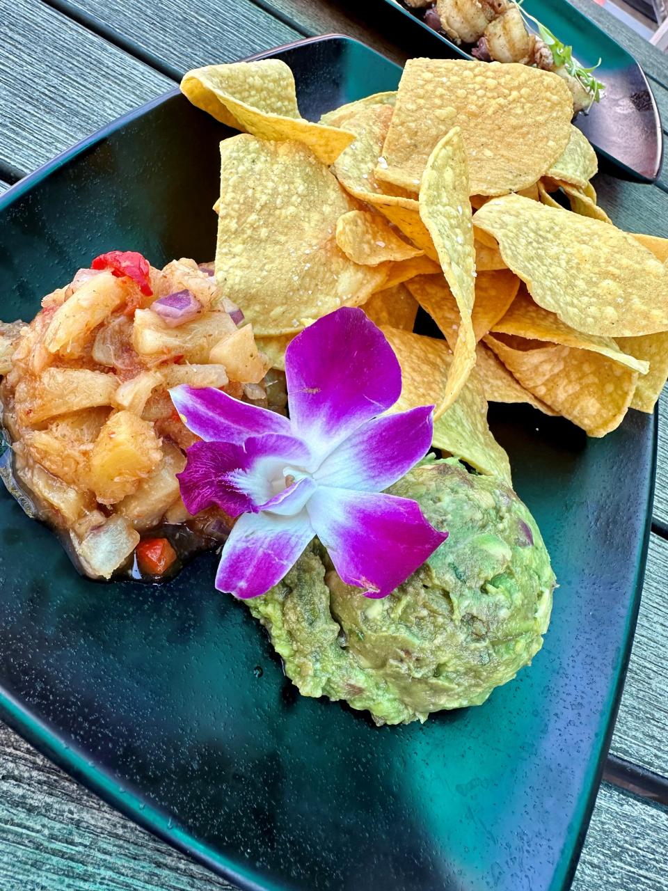 At Dolphins Waterfront Bar & Grille at Cape Crossing on Merritt Island, the guacamole was clearly made in-house, and the pineapple salsa was grand.