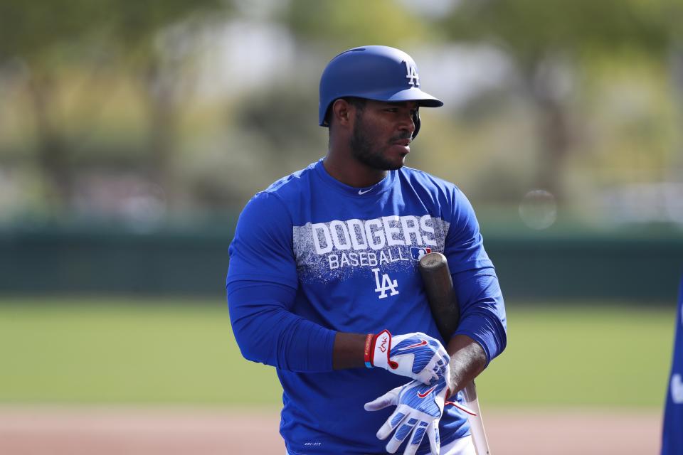 Yasiel Puig got some hitting tips from Senator Bernie Sanders. (AP Photo)