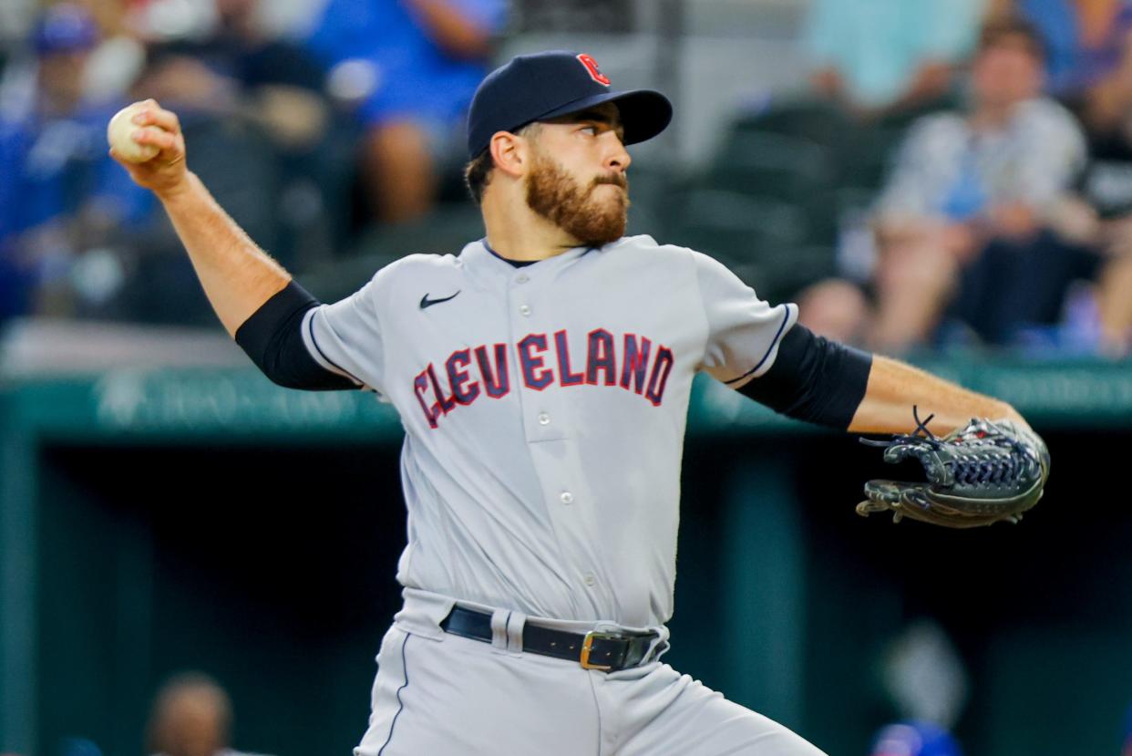 Cleveland Guardians pitcher Aaron Civale throws home during the first inning of a baseball game against the Texas Rangers in Arlington, Texas on Sunday, Sept. 25, 2022. (AP Photo/Gareth Patterson)