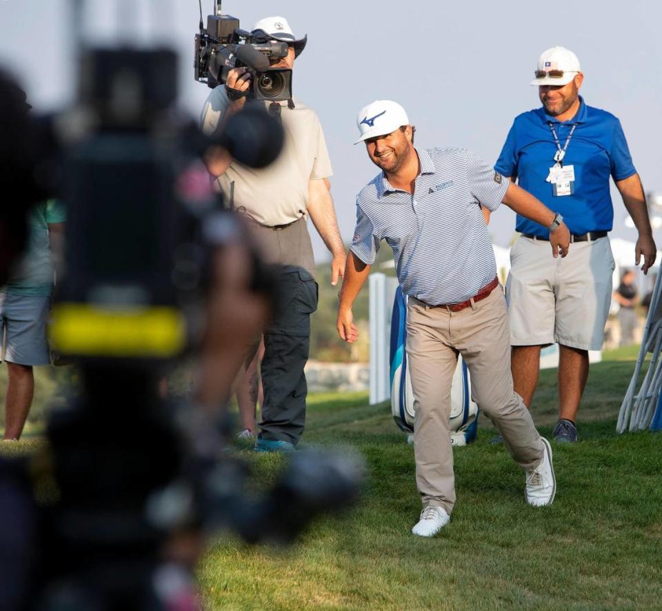 Winner Greyson Sigg makes a false start toward the podium at the trophy ceremony at the Albertsons Boise Open at Hillcrest Country Club on Aug. 22, 2021.