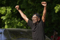 Lee Singleton reacts to the verdict in the murder trial against former Minneapolis police Officer Derek Chauvin, Tuesday, April 20, 2021, after listening to the verdict in the neighborhood where George Floyd grew up in Houston. (AP Photo/David J. Phillip)