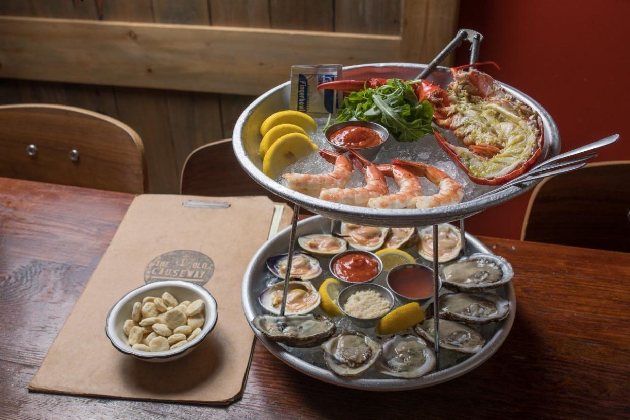 A seafood tower, complete with lobster, shrimp, oysters and clams, from The Old Causeway Steak & Oyster House in Manahawkin.