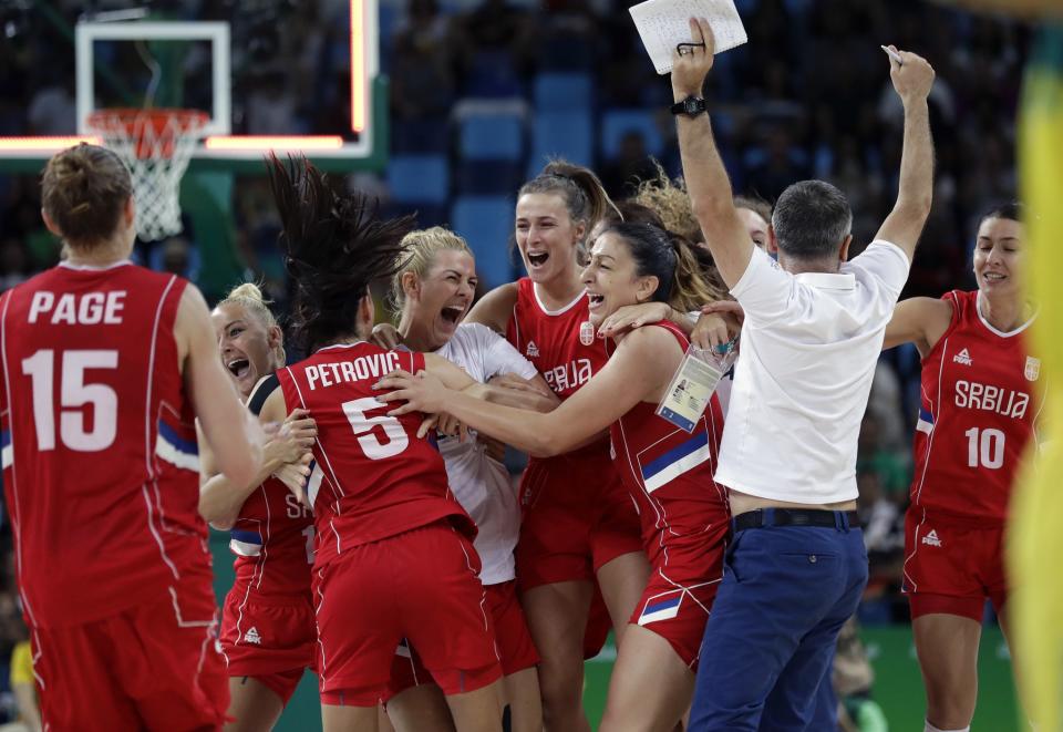 Team Serbia celebrates their win over Australia in the quarterfinals of the basketball tournament at the 2016 Summer Olympics in Rio de Janeiro, Brazil. (AP/Eric Gay)