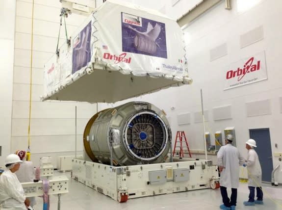 Orbital Sciences Cygnus spacecraft, the "Spaceship C. Gordon Fullerton," is seen in July 2013 after arriving at NASA's Wallops Flight Facility in Virginia for pre-launch processing.